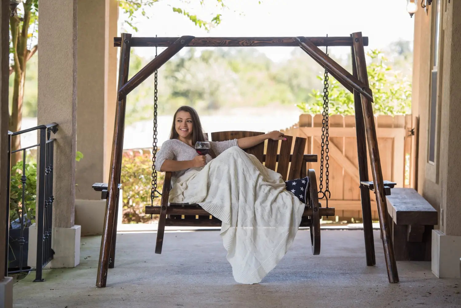 Woman relaxes on swing